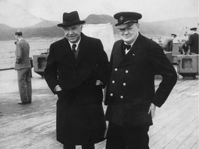 British statesman Winston Churchill (1874 - 1965, right) with Canadian-British press magnate Max Aitken, Lord Beaverbrook (1879 - 1964), on board HMS Prince of Wales during the Atlantic Conference with President Roosevelt, Newfoundland, August 1941.