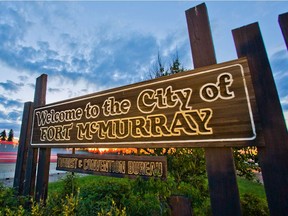 A Welcome to Fort McMurray sign.