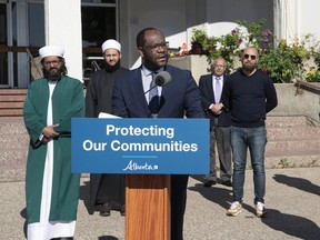 Minister of Justice Kaycee Madu provided, during a news conference in front of the Al Rashid Mosque in Edmonton on Friday, June 11, 2021.