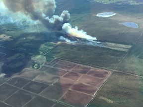 Wildfire EWF-075 was 40 hectares in size the evening of Tuesday, June 22, 2021 and classified as out-of-control in the Edson Forest Area. It was located nine kilometres west of Evansburg and moving south. Twenty-eight firefighters, four helicopters, six pieces of heavy equipment and six airtankers were fighting this wildfire. Supplied/Alberta Wildfire