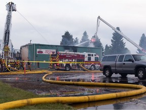 Stony Plain and Spruce Grove firefighters extinguish a blaze at the Westridge Curling Club at 5400 52 Street in Stony Plain, west of Edmonton, on Wednesday, June 23, 2021.