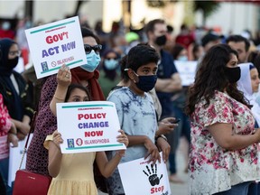 Demonstrators demanding action and protection for Muslim women gathered in solidarity during the Enough is Enough rally at Churchill Square in Edmonton on June 25, 2021.