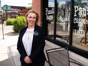 Mayoral candidate Kim Krushell poses for a photo outside The Grand Cafe & Bistro on 124 Street in Edmonton, on Friday, June 25, 2021. Krushell is a former city councillor and current tech executive.