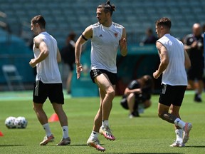 Wales forward Gareth Bale plays with a ball during their training session at Dalga Arena stadium in Baku on June 11, 2021. (Photo by OZAN KOSE / AFP) (Photo by OZAN KOSE/AFP via Getty Images)