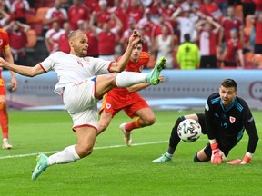Denmark's forward Martin Braithwaite shoots but doesn't score during the UEFA EURO 2020 round of 16 football match between Wales and Denmark at the Johan Cruyff Arena in Amsterdam on June 26, 2021.