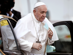 In this file photo, Pope Francis arrives to lead Holy Rosary prayer in Vatican gardens to end the month of May, at the Vatican, May 31, 2021.