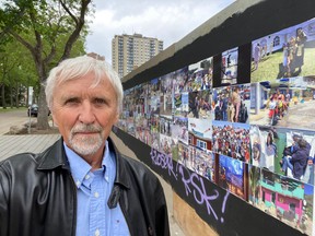 Jan Novotny stands beside his public photo installation recently at 89 Avenue and 99 Street in Edmonton.