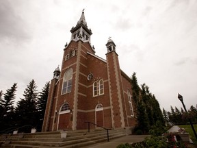 Morinville residents seek funds, answers a year after church fire The Roman Catholic Church of St. Jean Baptiste Parish was built in 1907.