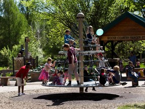 Children enjoy playing in the playground at Rundle Park on Sunday, June 6, 2021 .  Greg Southam-Postmedia