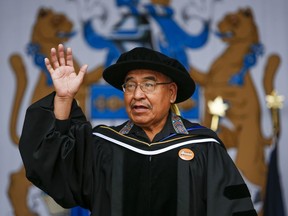 At an outdoor drive-in convocation ceremony Mount Royal University bestows an honorary Doctor of Laws on Blackfoot Elder and residential school survivor Clarence Wolfleg in Calgary, Tuesday, June 8, 2021.