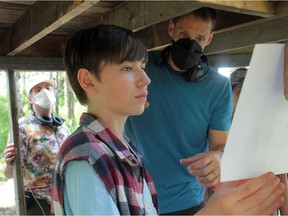 Cinematographer Wes Miron, right, and director Trevor Anderson set up a scene with Dominic Lippa, who plays Carter in Before I Change My Mind. Fish Griwkowsky photo