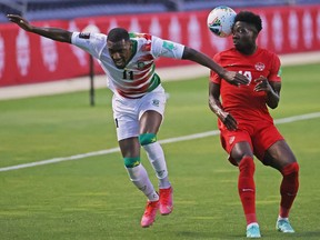 Alphonso Davies, right, won't be at the Gold Cup for Team Canada. Getty images