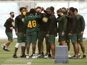 The Edmonton Elks finish a team practice inside the field house at Commonwealth Community Recreation Centre in Edmonton on Saturday, July 17, 2021. The practice was moved indoors because of British Columbia wildfire smoke that is currently blanketing Edmonton.