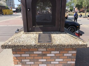 Four bronze plaques bearing the names of fallen Edmonton firefighters were discovered stolen from the bell tower at the Firefighters Memorial Plaza at 10322 83 Avenue on Saturday, July 24. The Edmonton Firefighters Memorial Society is pleading for their return. Photos supplied by the Edmonton Firefighters Memorial Society