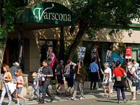 A rally outside the Varscona Hotel on Whyte Avenue in Edmonton on Tuesday July 13, 2021 in support of the unionized staff at Hilton Vancouver Metrotown Hotel in BC who have been locked out of their jobs for over 12 weeks. Both hotels are owned by DSDL Canada Investments.