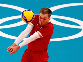 Blair Bann of Canada passes a ball against Italy on July 24, 2021, in Pool A action in the Tokyo 2020 Olympics at Ariake Arena, Tokyo, Japan.