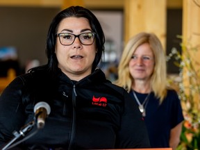 Registered nurse Kerrie Mealey speaks at an NDP news conference in Grande Prairie, Thursday, July 22, 2021.