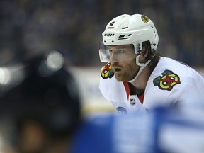 Chicago Blackhawks defenceman Duncan Keith lines up for a faceoff against the Winnipeg Jets in Winnipeg on Dec. 11, 2018.