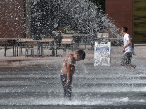 It time for a soaker as the City Hall pool was being utilized Wednesday as more hot weather is making its way into Edmonton, July 7, 2021.