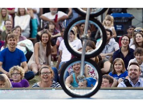 The crowd watches Bob at Large perform during the last day of the Edmonton International Fringe Theatre Festival in Edmonton, Alta. on Sunday, Aug. 25, 2013.