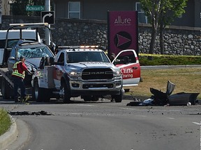 One man was killed and two others transported to hospital in this single-vehicle that crashed into a utility pole that sliced the car in half, which speed is being considered a factor along Rabbit Hill Rd. and Mactaggart Dr. in Edmonton, July 24, 2021.