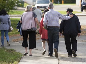 Family and supporters of victims leave the review board hearing for Matthew de Grood at Alberta Hospital, in Edmonton Tuesday Sept. 17, 2019. Matthew de Grood was found not criminally responsible by reason of a mental disorder in the April 15, 2014, deaths of five young adults at a Calgary house party.