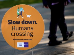 A lawn sign at 81 Avenue in Edmonton on Friday, July 9, 2021. The speed limit on residential streets in the city will drop  to 40 km/h from 50 km/h on Aug. 6, 2021.