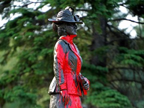 The statue of Emily Murphy at the entrance to Emily Murphy Park in Edmonton was vandalized with red paint on Tuesday July 13, 2021.