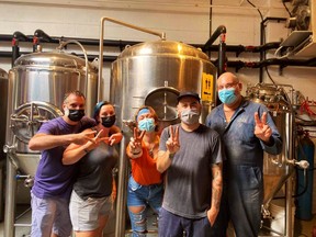 Staff from People’s Pint Brewing Company in Toronto in a social media post showing they are fully vaccinated. The brewery was one of the first businesses listed on Safetodo.ca.