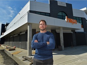 Tim Pasma, Hope Mission's manager of homeless programming, standings in front of the new Herb Jamieson Centre men's shelter, in Edmonton, August 26, 2021. The centre is set to open Oct. 1. Ed Kaiser/Postmedia