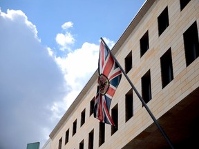 The british national flag waves outside the British Embassy on August 11, 2021 in Berlin, Germany.