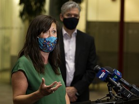 Edmonton Public Schools board chairwoman Trisha Estabrooks  and Edmonton Public Schools’ superintendent Darrel Robertson at a news conference in Edmonton on Aug. 16, 2021.