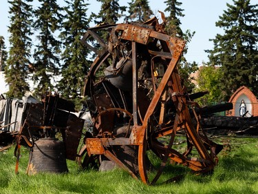 Damaged church bells are seen at the site of St. Jean Baptiste Church in Morinville, north of Edmonton, on Wednesday, Aug. 25, 2021. The church burned down on June 30 and the fire is under investigation. Photo by Ian Kucerak