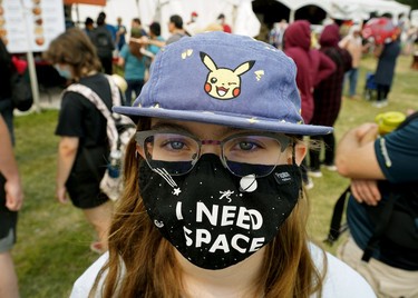 Katherine Grebenc adhered to pandemic social distancing protocols during the Edmonton Heritage Festival in Hawrelak Park on Sunday August 1, 2021.