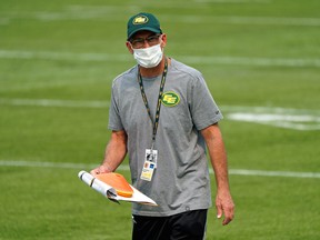 Edmonton Elks special teams co-ordinator Chris Rippon monitors training camp in Edmonton on July 15, 2021. COVID protocols have forced a cancellation of practice Friday, Aug. 6, 2021, one day ahead of their 2021 CFL season opener.