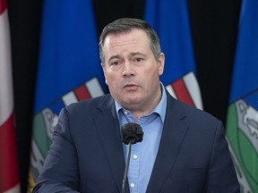 Alberta Premier Jason Kenney urged unvaccinated Albertans to get the shot at Friday's news conference, announcing those who do will receive $100 gift cards.