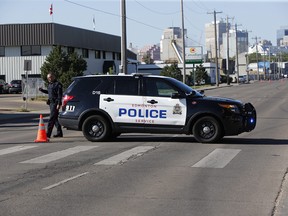 Edmonton police investigate a suspicious death earlier this year at 92 Street and Stadium Road. Several candidates in Edmonton's mayoral election are campaigning hard on crime.