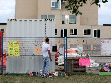 Jodell Morin during a protest on the grounds of the former Charles Camsell Indian Hospital, in Edmonton Monday Aug. 9, 2021. The protesters hope to bring awareness to the discovery of over 5,000 unmarked graves at Canada's former residential school sites. Over nearly 50 days the nightly protest has hosted healers, drummers, speakers, survivors and singers. Part of the hospital site was recently searched for unmarked graves and future searches are planned.