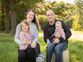 Barbara and Mike Fekete with their two daughters, Cecilia, left and Delilah.