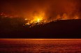 The White Rock Lake fire burns near Vernon's Westside on Aug. 6.