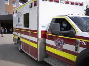 An ambulance parked outside the Willow Square Continuing Care Centre in Fort McMurray on June 23, 2021.