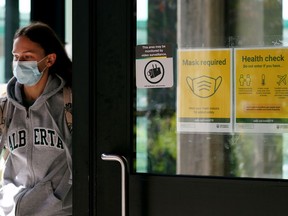 A student exits the Students Union Building at the University of Alberta in Edmonton on Thursday September 14, 2021.