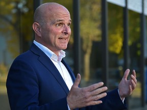 Randy Boissonnault outside his campaign office, speaks to the media after getting the mail-in ballot results from Elections Canada that he won in the Edmonton Centre riding, Wednesday, Sept. 22, 2021.