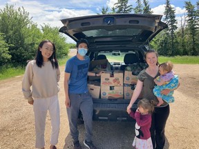 Farmlink Project Canada has rescued around 40,000 pounds of surplus food by connecting farms with local food banks. From left to right: Cindy Zhang, Tom Zhao and Kirsty Frayn from Pasture Perfect Farms in Coronation.