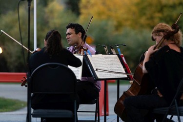 The Vaughan String Quartet, (left to right) are Fabiola Amorim on viola, Vladimir Rufino on violin, Mattia Berrini on violin and Silvia Buttiglione on cello, perform an outdoor concert at Festival Place in Sherwood Park, on Friday, Sept. 24, 2021.