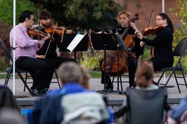 The Vaughan String Quartet, comprised of Vladimir Rufino on violin, Mattia Berrini on violin, Fabiola Amorim on viola and Silvia Buttiglione on cello, perform an outdoor concert at Festival Place in Sherwood Park, on Friday, Sept. 24, 2021.