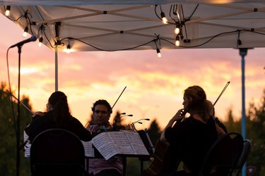 The Vaughan String Quartet, (left to right) Fabiola Amorim on viola, Vladimir Rufino on violin, Mattia Berrini on violin and Silvia Buttiglione on cello, perform an outdoor concert at Festival Place in Sherwood Park, on Friday, Sept. 24, 2021.