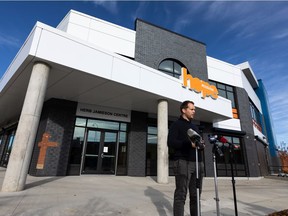 Tim Pasma, Hope Mission's manager of homeless programming, speaks outside of the new Herb Jamieson Centre in Edmonton on Tuesday, Sept. 28, 2021. The centre, which is expected to open in October 2021, is a 24-hour shelter for men.