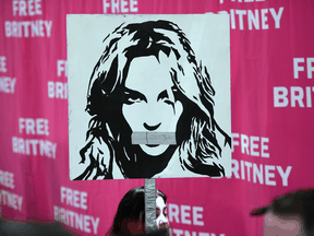 Britney Spears supporters gather outside the Los Angeles County Courthouse during a scheduled hearing in the singer's guardianship case, July 14, 2021.