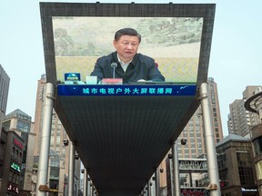 A screen shows a news broadcast of Chinese President Xi Jinping in Beijing, China, on Saturday, June 26, 2021.